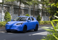 腾势全新高端SUV路试谍照曝光！造型非常保时捷？